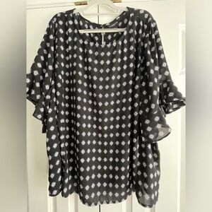 Black top with white decor